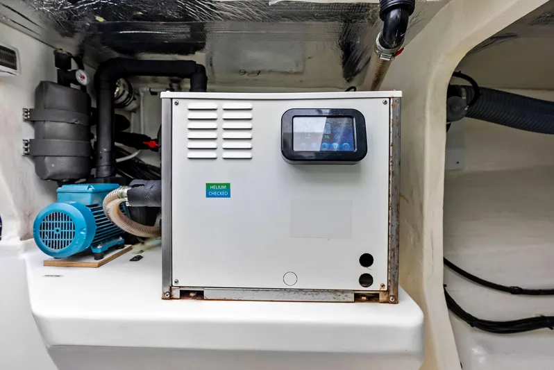 53 Powercat Yacht Photos Pics Engine room of 2021 Leopard 53 Powercat with generator and machinery.