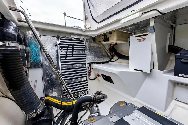 53 Powercat Yacht Photos Pics Engine room of 2021 Leopard 53 Powercat, showcasing mechanical components and equipment.