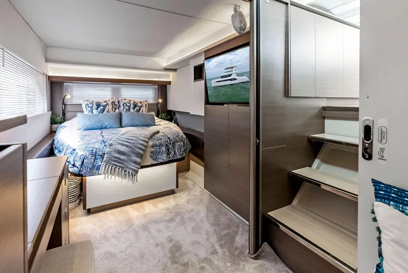 53 Powercat Yacht Photos Pics Luxurious bedroom interior of 2021 Leopard 53 Powercat yacht with modern decor.