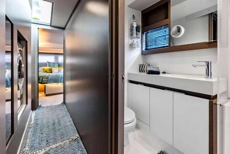 53 Powercat Yacht Photos Pics Luxurious interior of 2021 Leopard 53 Powercat yacht with modern bathroom and cozy bedroom.