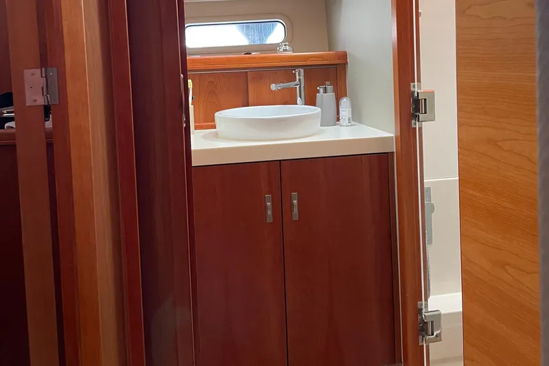  Yacht Photos Pics Luxurious wooden bathroom interior on a 2016 Moody 54 DS yacht.