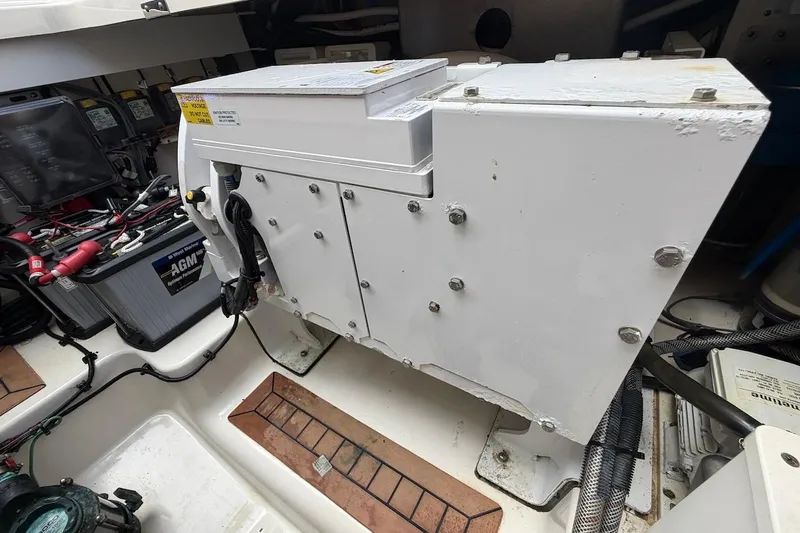 La Grisselle Yacht Photos Pics Engine compartment of a Boston Whaler 405 Conquest with AGM battery and wiring and Seakeeper.