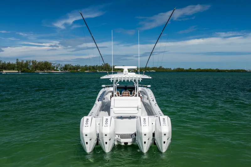  Yacht Photos Pics 2024 Costa Custom Boats 34 SV on water, featuring multiple outboard engines.