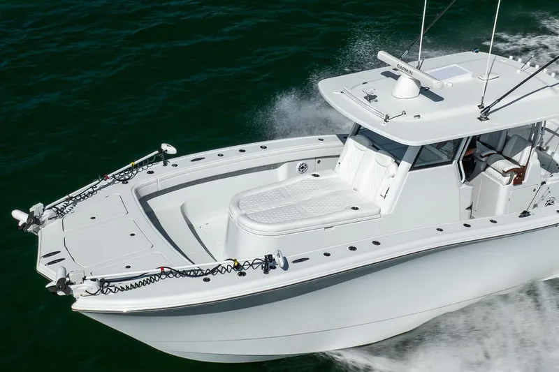  Yacht Photos Pics 2024 Costa Custom Boats 34 SV cruising on water, showcasing sleek design and advanced features.