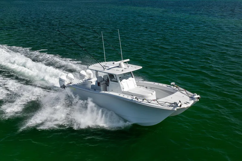  Yacht Photos Pics 2024 Costa Custom Boats 34 SV cruising on open water, showcasing sleek design and powerful performance.