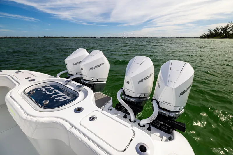  Yacht Photos Pics 2024 Costa Custom Boats 34 SV with four Mercury outboard engines on open water.