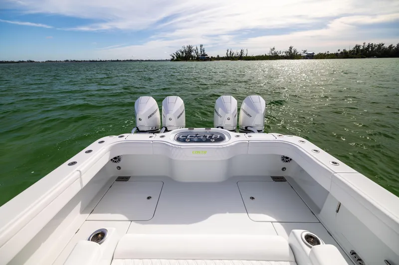  Yacht Photos Pics 2024 Costa Custom Boats 34 SV on water, featuring powerful Mercury engines.