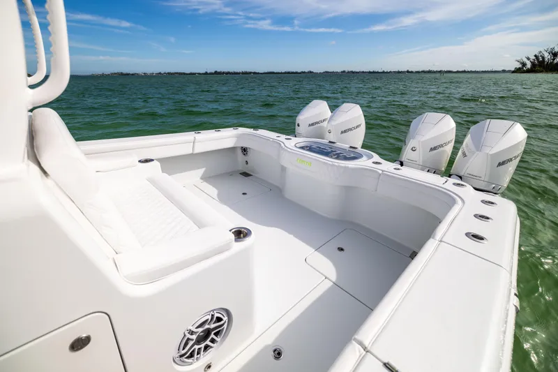  Yacht Photos Pics 2024 Costa Custom Boats 34 SV on water, featuring spacious deck and powerful Mercury engines.