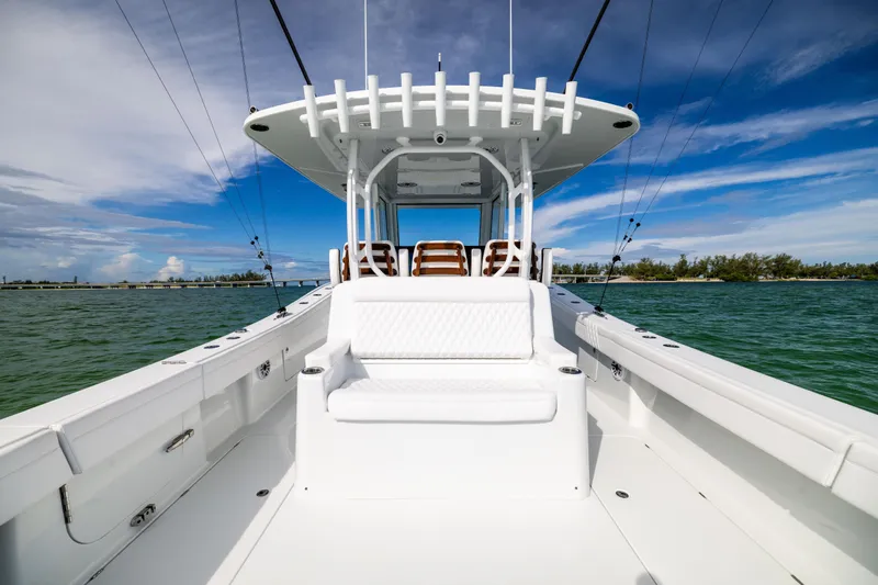  Yacht Photos Pics 2024 Costa Custom Boats 34 SV on water, showcasing sleek design and spacious deck.