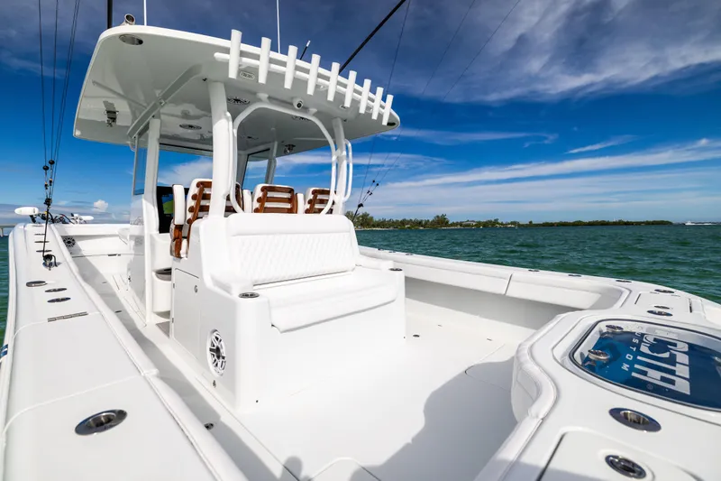  Yacht Photos Pics 2024 Costa Custom Boats 34 SV on water, showcasing sleek design and spacious deck.