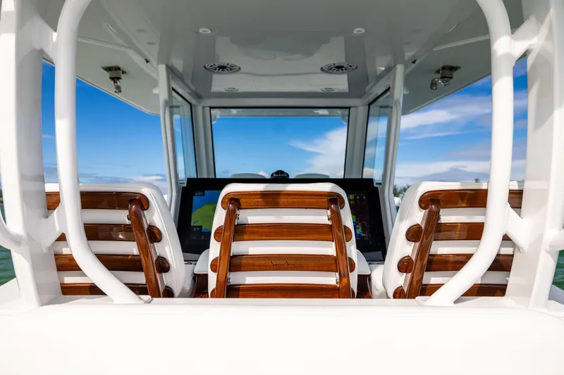  Yacht Photos Pics 2024 Costa Custom Boats 34 SV helm with wooden seats and modern navigation system.