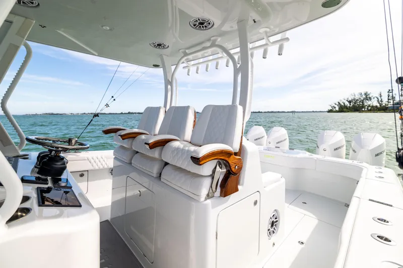  Yacht Photos Pics 2024 Costa Custom Boats 34 SV interior with luxurious seating and ocean view.