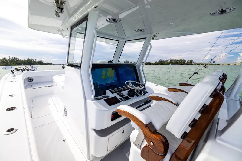  Yacht Photos Pics 2024 Costa Custom Boats 34 SV cockpit with advanced navigation system and luxurious seating.