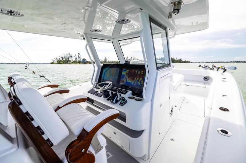  Yacht Photos Pics 2024 Costa Custom Boats 34 SV cockpit with advanced navigation system and luxurious seating.