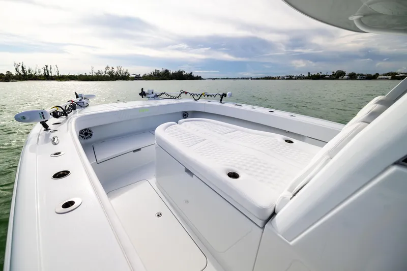  Yacht Photos Pics 2024 Costa Custom Boats 34 SV, sleek white deck, cruising on calm waters.