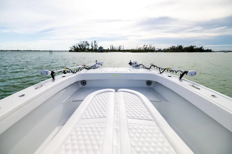  Yacht Photos Pics 2024 Costa Custom Boats 34 SV on calm waters, showcasing sleek design and spacious deck.