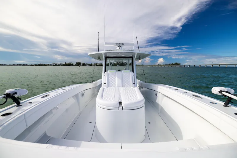  Yacht Photos Pics 2024 Costa Custom Boats 34 SV on open water, showcasing sleek design and spacious deck.