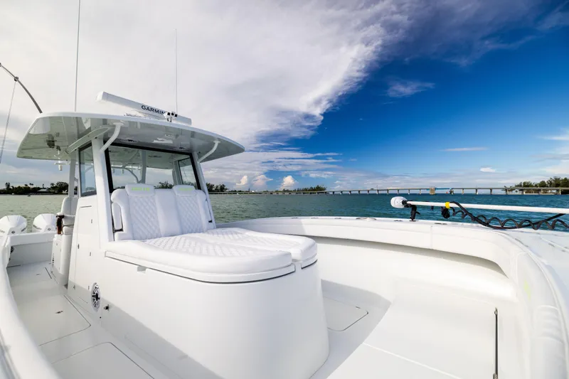  Yacht Photos Pics 2024 Costa Custom Boats 34 SV on water, showcasing sleek design and spacious deck.