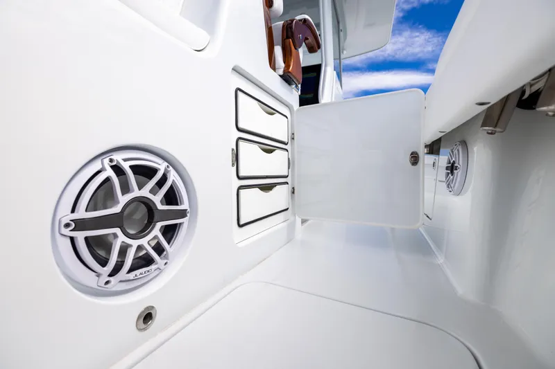  Yacht Photos Pics 2024 Costa Custom Boats 34 SV interior with speaker and storage compartments.