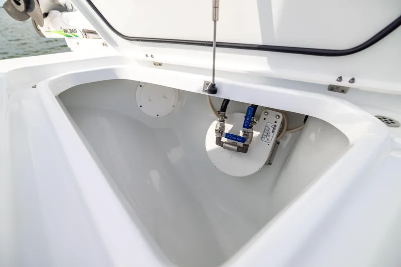  Yacht Photos Pics 2024 Costa Custom Boats 34 SV storage compartment with mechanical components.