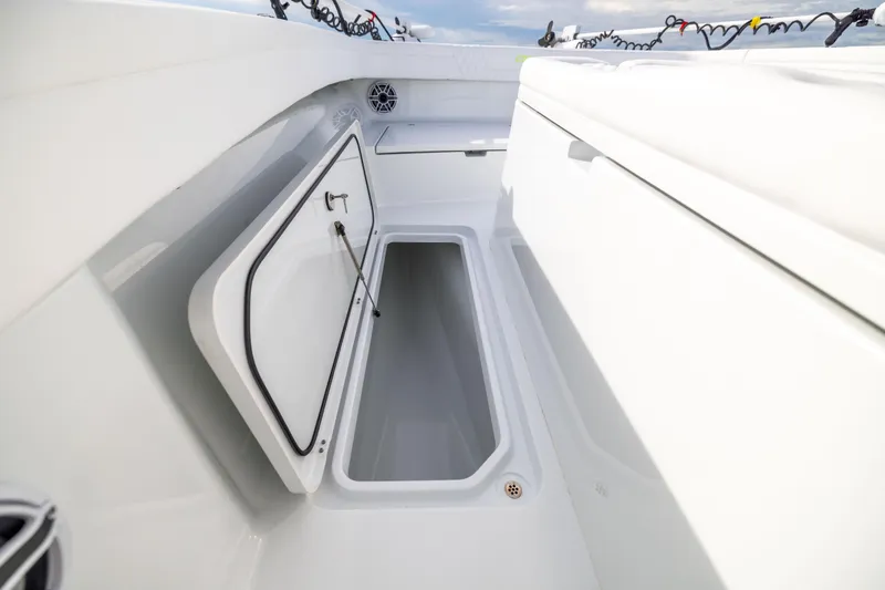  Yacht Photos Pics 2024 Costa Custom Boats 34 SV storage compartment with open hatch, showcasing sleek design.