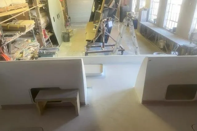  Yacht Photos Pics Workshop view of 2027 Compmillenia Lightspeed Tender under construction, showcasing interior details.