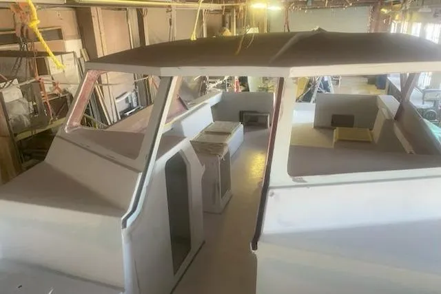  Yacht Photos Pics 2027 Compmillenia Lightspeed Tender under construction in a workshop setting.