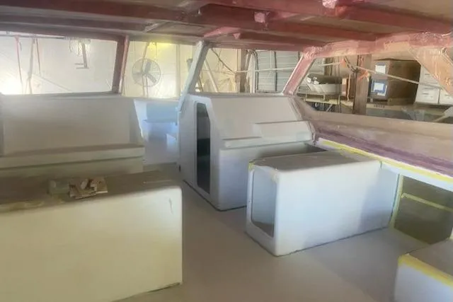  Yacht Photos Pics Interior view of 2027 Compmillenia Lightspeed Tender under construction in a workshop.