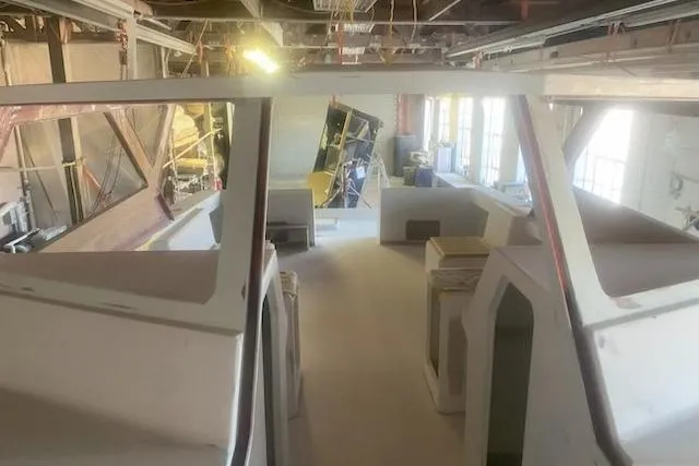  Yacht Photos Pics 2027 Compmillenia Lightspeed Tender under construction in a workshop setting.