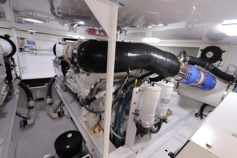 Breakaway Yacht Photos Pics Engine room of a 2004 Viking 56 yacht, showcasing machinery and components.