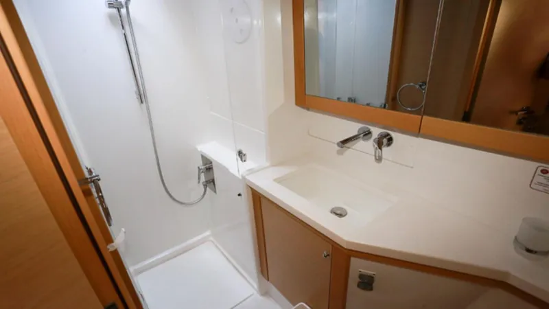  Yacht Photos Pics Bathroom interior of 2017 Lagoon 450 F yacht, featuring shower and sink.