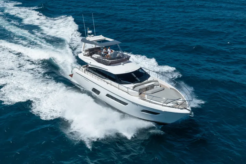 Sublime Yacht Photos Pics 2021 Ferretti Yachts 550 cruising on open sea, showcasing luxury and performance.
