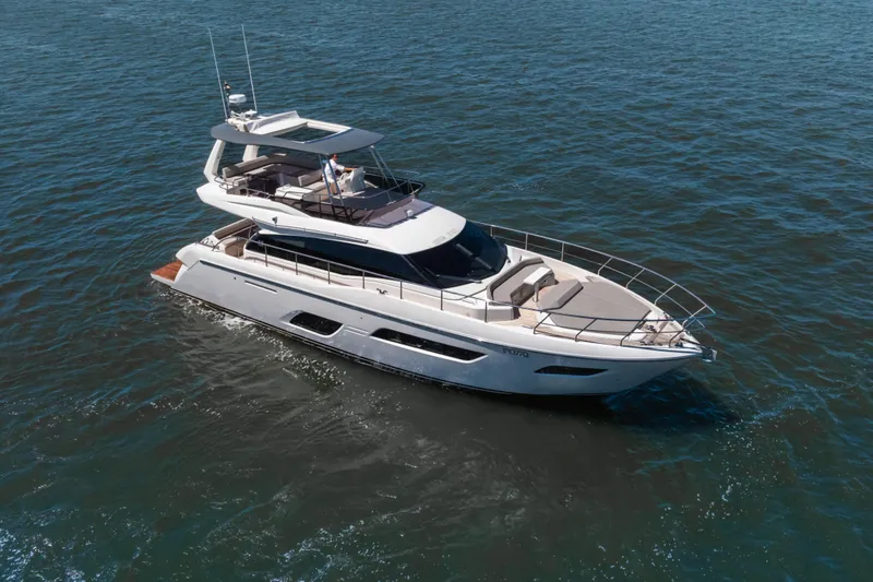 Sublime Yacht Photos Pics 2021 Ferretti Yachts 550 cruising on open water, showcasing sleek design and luxury features.
