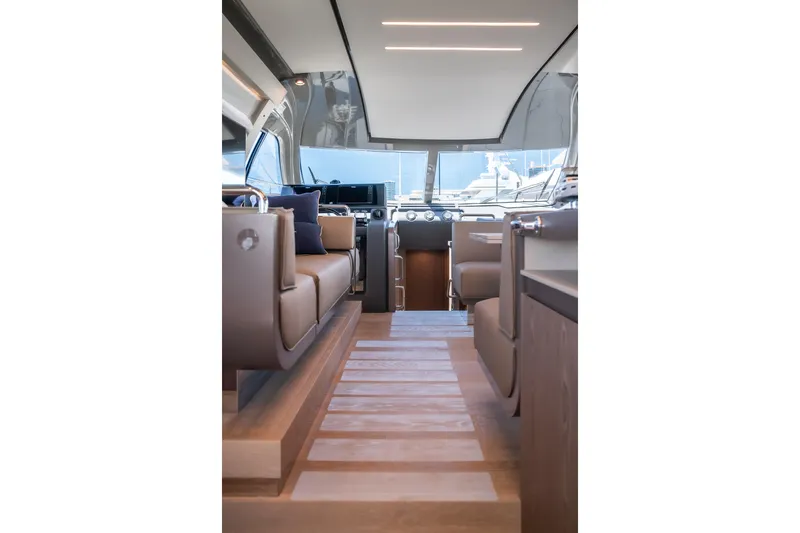 Sublime Yacht Photos Pics Luxurious interior of 2021 Ferretti Yachts 550, featuring elegant seating and modern design.