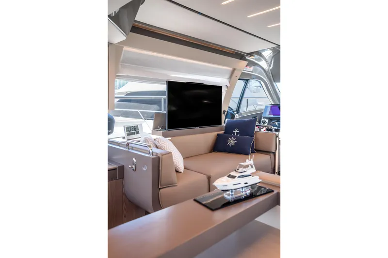 Sublime Yacht Photos Pics Luxurious interior of 2021 Ferretti Yachts 550 with modern seating and decor.