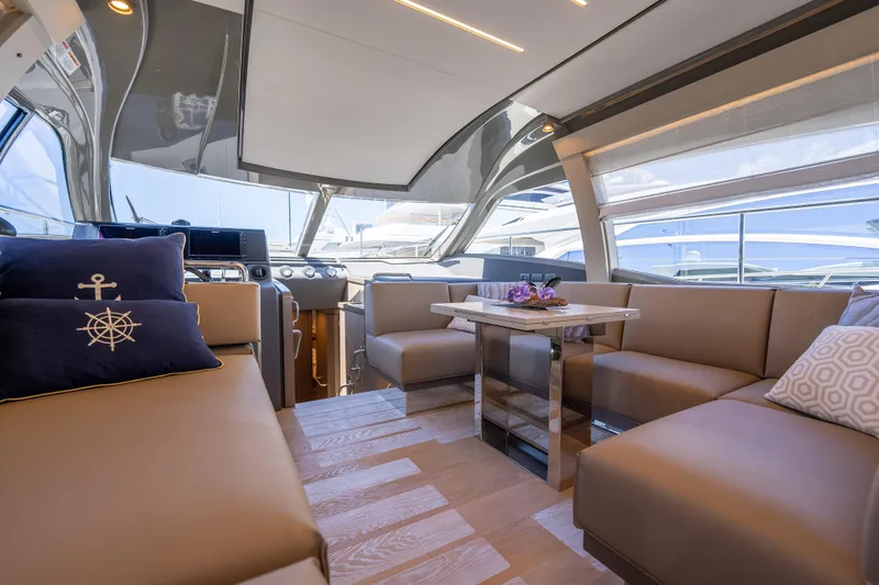 Sublime Yacht Photos Pics Luxurious interior of 2021 Ferretti Yachts 550 with elegant seating and modern design.