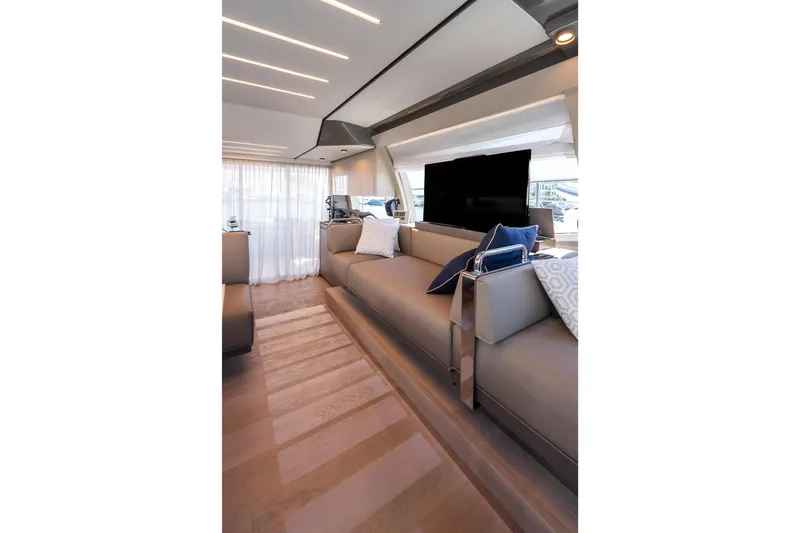 Sublime Yacht Photos Pics Luxurious interior of 2021 Ferretti Yachts 550 with modern seating and elegant decor.