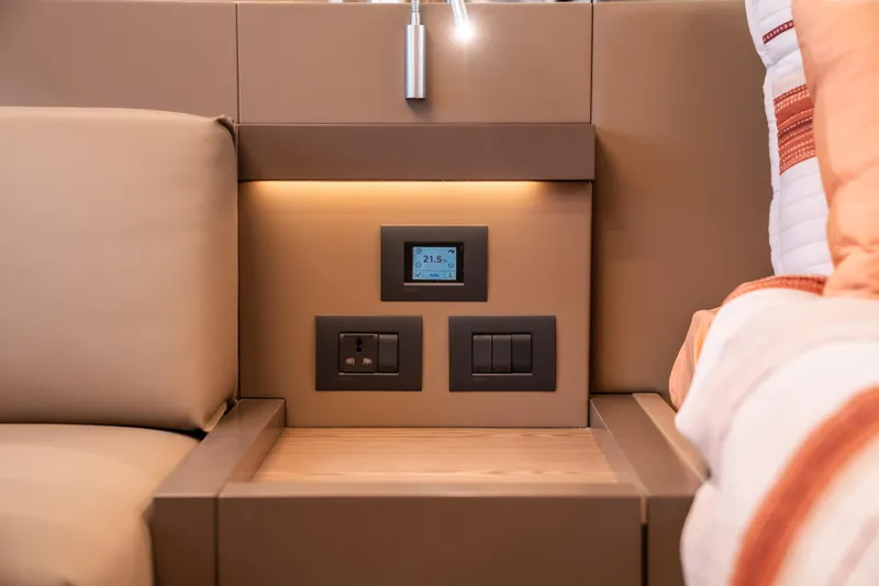 Sublime Yacht Photos Pics Luxurious interior of 2021 Ferretti Yachts 550 with modern control panel and lighting.