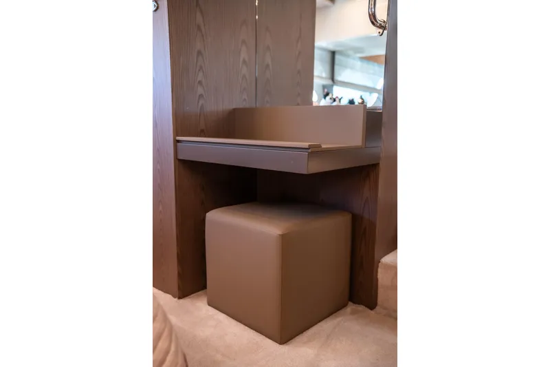 Sublime Yacht Photos Pics Luxurious interior of 2021 Ferretti Yachts 550 with elegant seating and wooden accents.