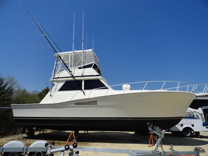  Yacht Photos Pics 1989 Viking 41 Sportfish Convertible on stands, side view.