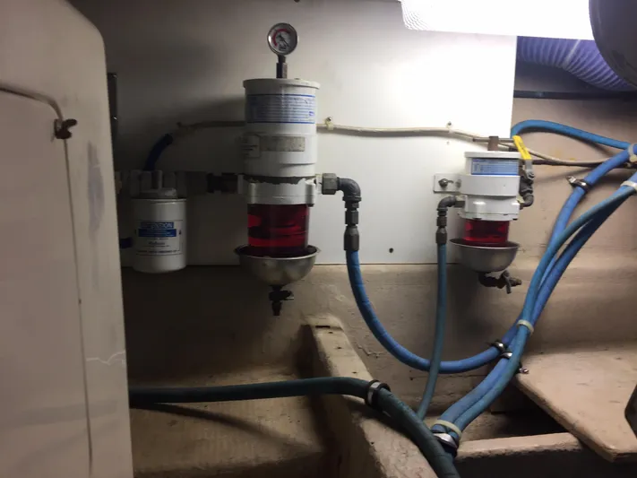  Yacht Photos Pics Engine room of 1989 Viking 41 Sportfish Convertible with fuel filters.