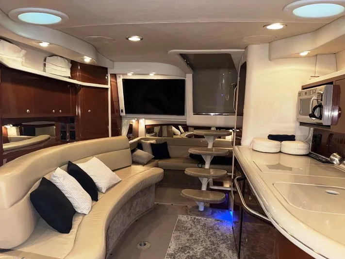  Yacht Photos Pics Luxurious interior of a 2008 Sea Ray 340 Sundancer yacht with plush seating and modern amenities.