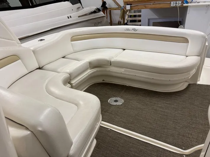  Yacht Photos Pics Luxurious seating area on a 2008 Sea Ray 340 Sundancer yacht, featuring white upholstery.