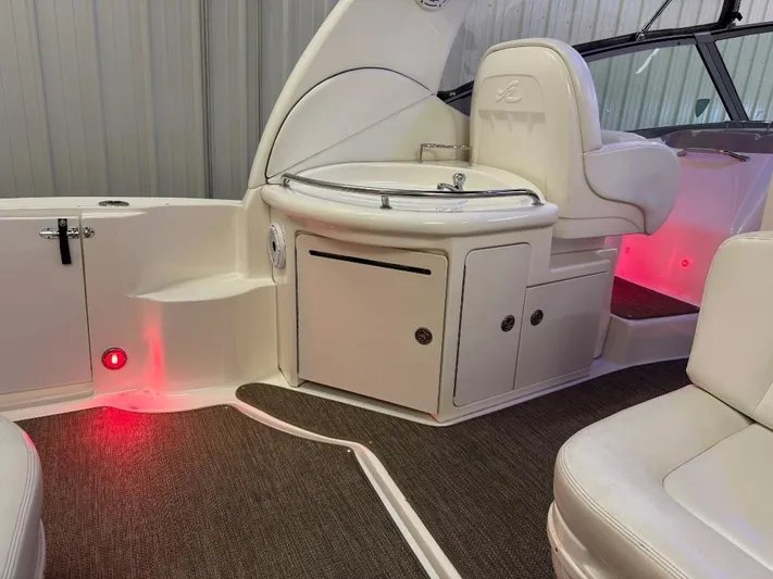  Yacht Photos Pics 2008 Sea Ray 340 Sundancer interior with seating and ambient red lighting.