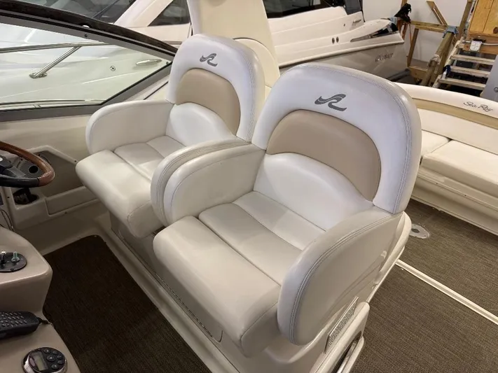  Yacht Photos Pics Luxury seating on a 2008 Sea Ray 340 Sundancer boat, featuring plush white upholstery.