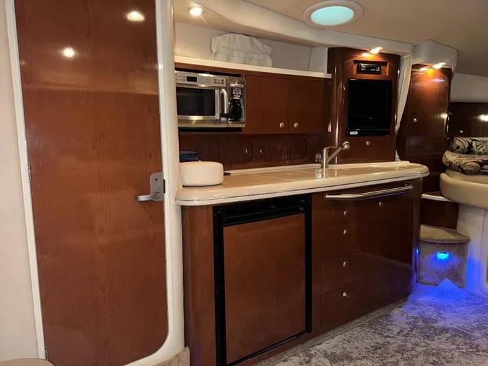  Yacht Photos Pics Interior of 2008 Sea Ray 340 Sundancer yacht with modern kitchen amenities.