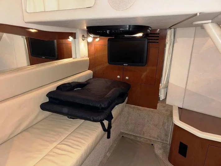  Yacht Photos Pics Interior cabin of 2008 Sea Ray 340 Sundancer with seating and TV.