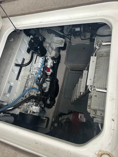  Yacht Photos Pics Engine compartment of 2015 Sea Ray 510 Fly yacht, showcasing mechanical components.