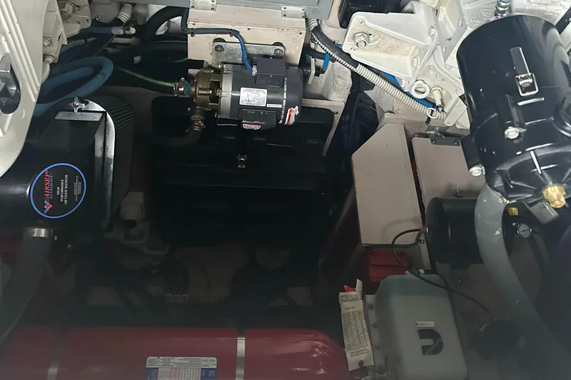  Yacht Photos Pics Engine compartment of a 2015 Sea Ray 510 Fly yacht, showcasing mechanical components and wiring.