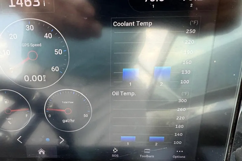Drama Free Yacht Photos Pics Dashboard display of 2022 Cobalt R30 showing GPS speed, coolant, and oil temperatures.